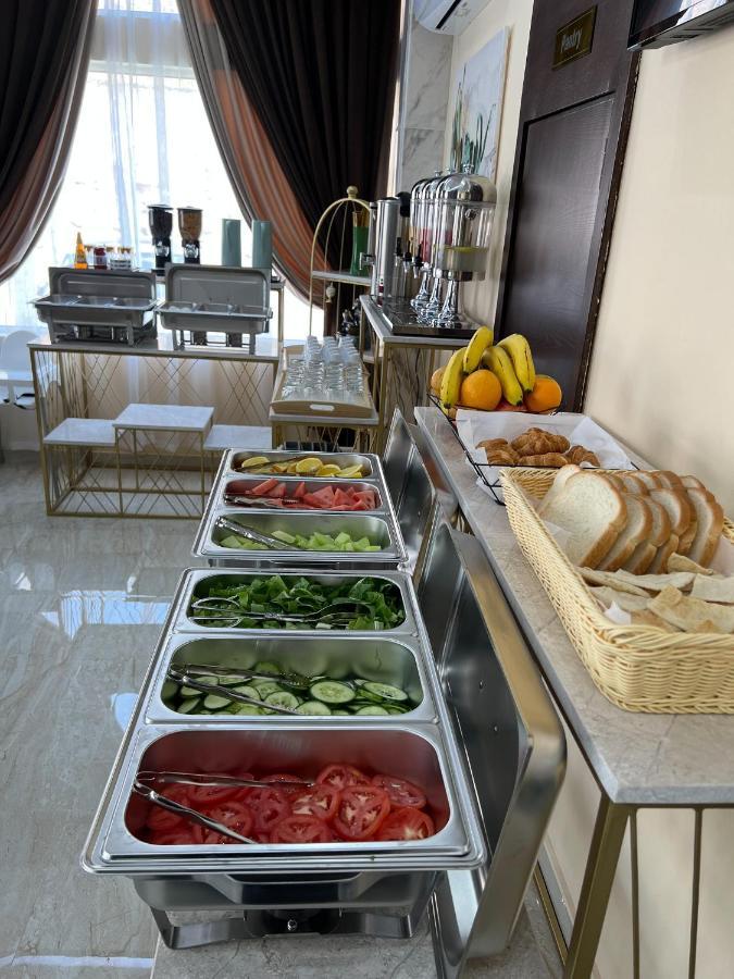 Blue Rose Hotel Al Amarat Exterior foto