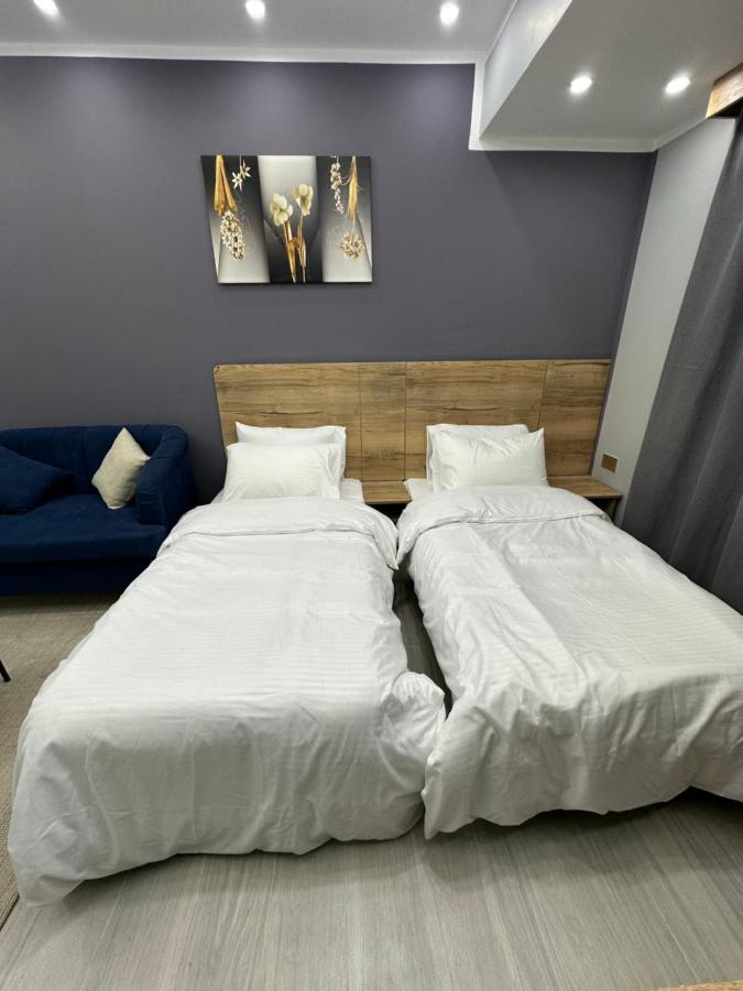 Blue Rose Hotel Al Amarat Exterior foto
